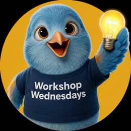 Flobert, the Flowbird mascot, wearing a Workshop Wednesdays t-shirt and holding a lightbulb