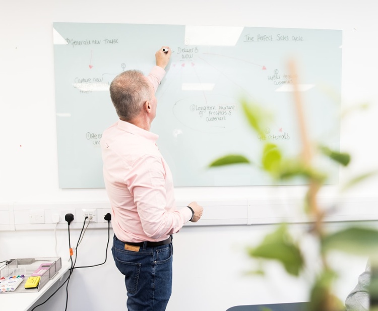 Jason Rainbird and his whiteboard